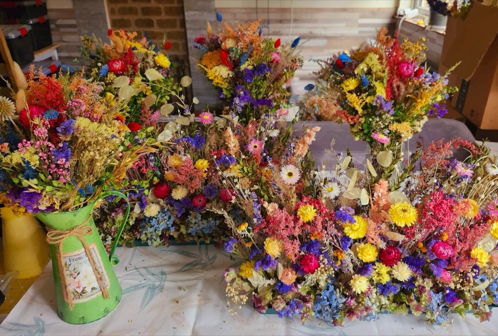 A display of colourful dried-flower arrangements